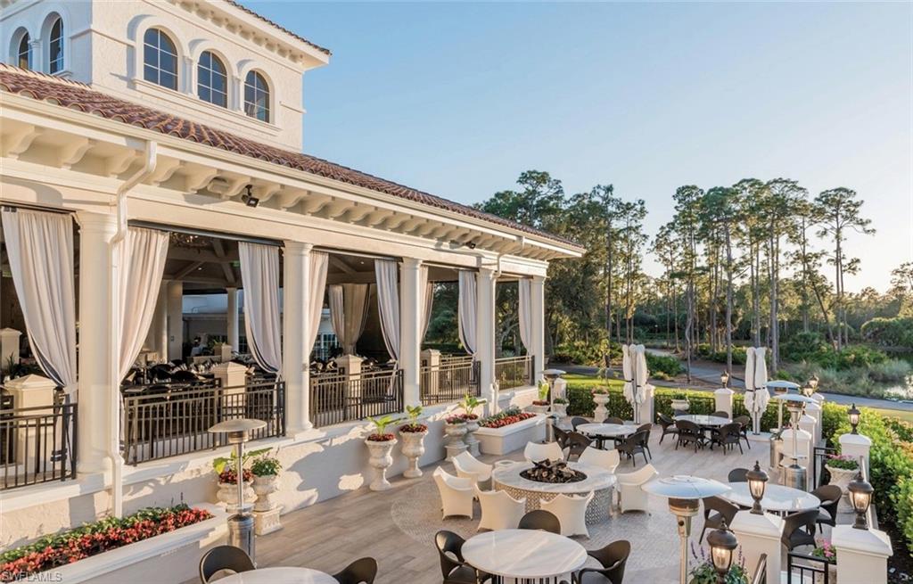 16683 Lucarno Way Naples, FL 34110 - Photo 33 of 35 a front view of a building with outdoor seating