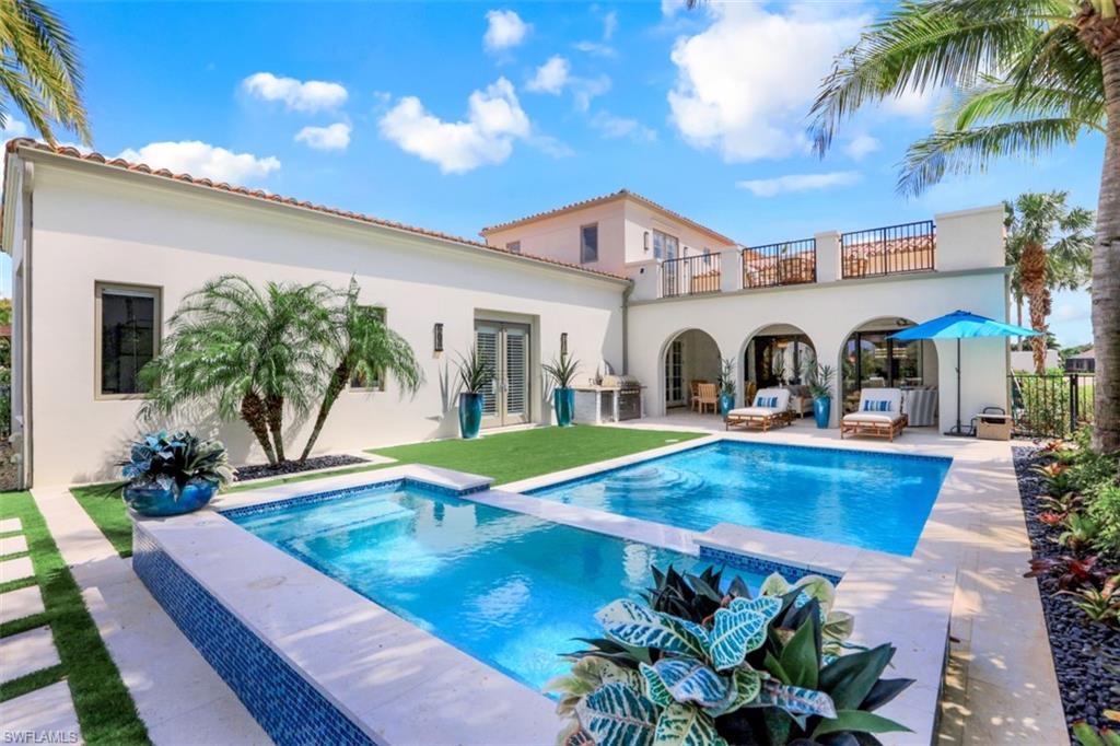 16683 Lucarno Way Naples, FL 34110 - Photo 5 of 35 a view of a house with swimming pool