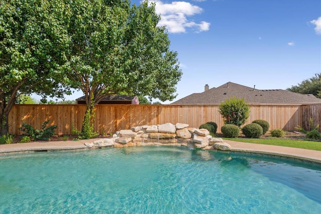 203 Silver Spur Trail Waco, TX 76657 - Photo 29 of 39 View of pool featuring a fenced backyard