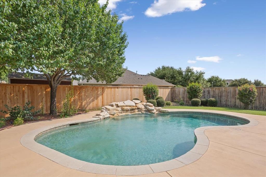 203 Silver Spur Trail Waco, TX 76657 - Photo 30 of 39 View of pool featuring a fenced backyard and a patio