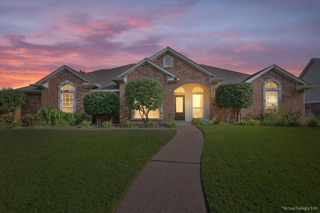 203 Silver Spur Trail Waco, TX 76657 - Photo 38 of 39 View of front of house with brick siding and a front yard