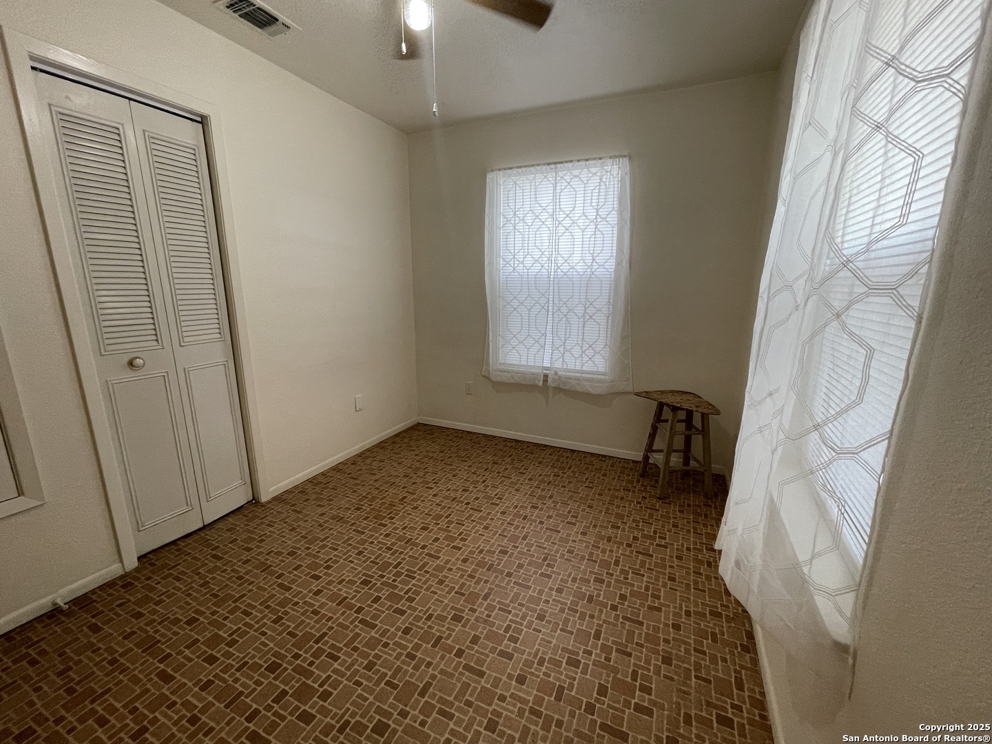 311 3rd Street Christine, TX 78012 - Photo 7 of 10 a view of room and window