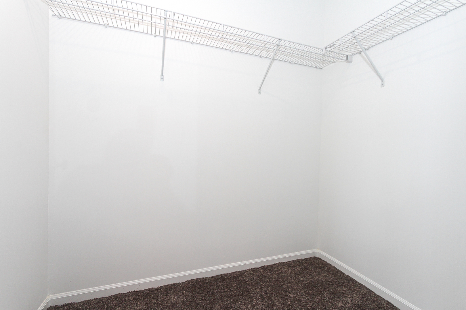 451 Comstock Road South Elgin, IL 60177 - Photo 19 of 30 a view of a room with racks on the wall
