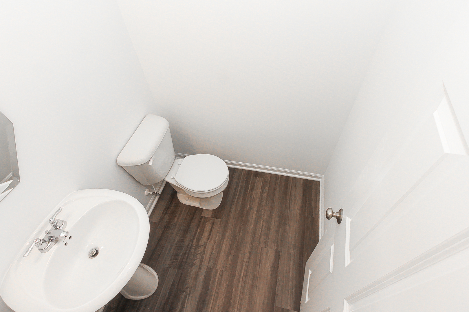 451 Comstock Road South Elgin, IL 60177 - Photo 27 of 30 a bathroom with a toilet and a sink