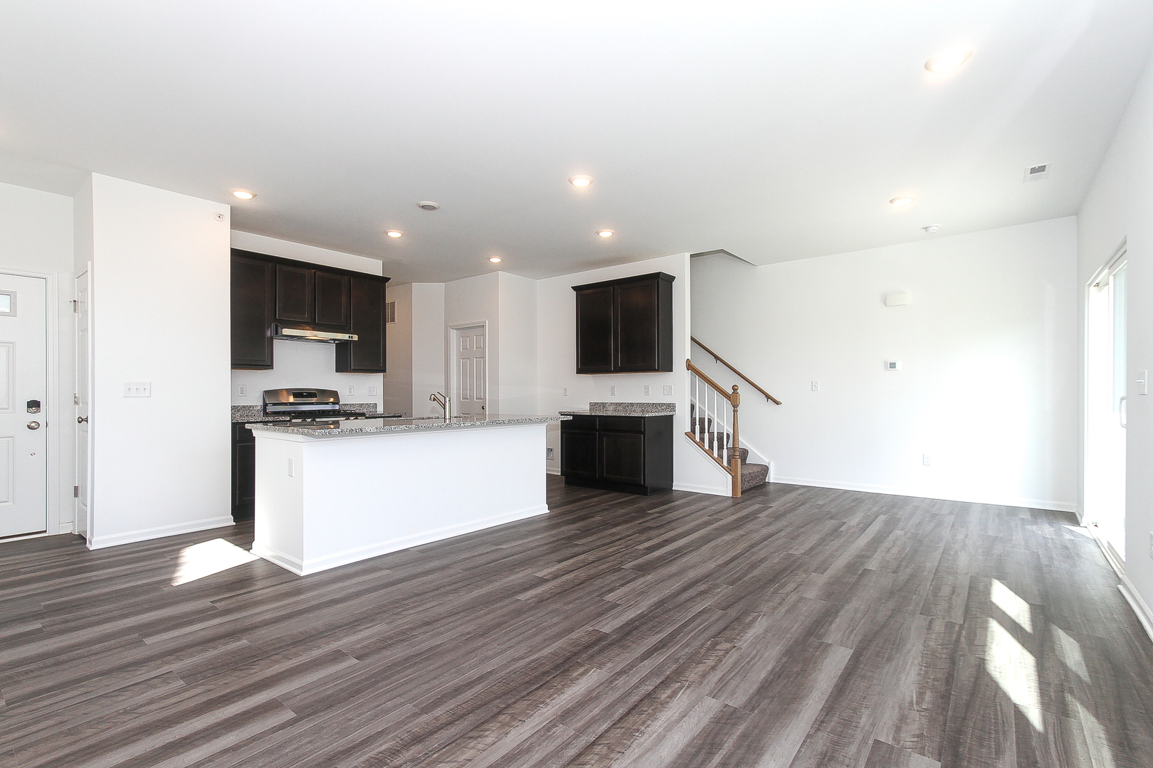 451 Comstock Road South Elgin, IL 60177 - Photo 6 of 30 a view of kitchen with microwave stove refrigerator and cabinets