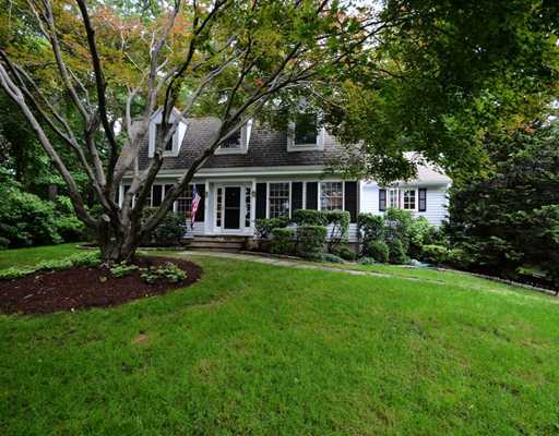4 Barringer Road Darien, CT 06820 - Photo 1 of 19 a front view of a house with a garden
