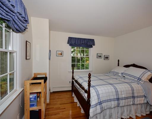 4 Barringer Road Darien, CT 06820 - Photo 12 of 19 a bedroom with a bed and a window