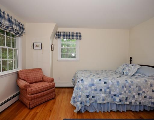4 Barringer Road Darien, CT 06820 - Photo 13 of 19 a bedroom with a bed couch and window