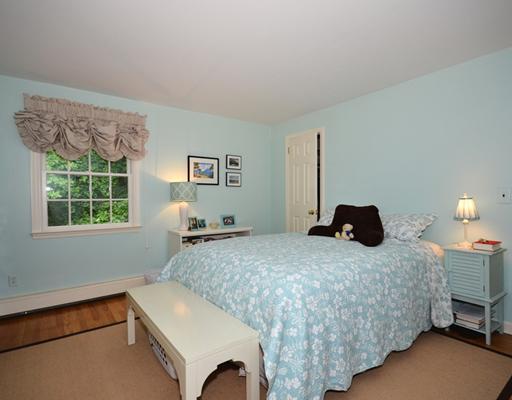 4 Barringer Road Darien, CT 06820 - Photo 14 of 19 a bedroom with a bed and window