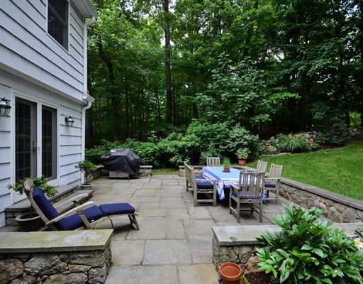 4 Barringer Road Darien, CT 06820 - Photo 18 of 19 a view of backyard with outdoor seating a patio and plants