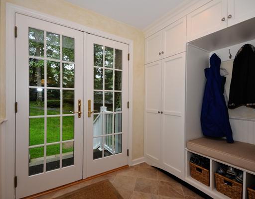 4 Barringer Road Darien, CT 06820 - Photo 10 of 19 a view of walk in closet with clothes and window