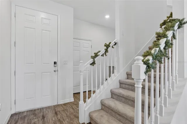 a bathroom with a sink toilet and a mirror