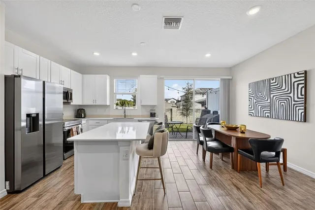 a view of a dining room with furniture