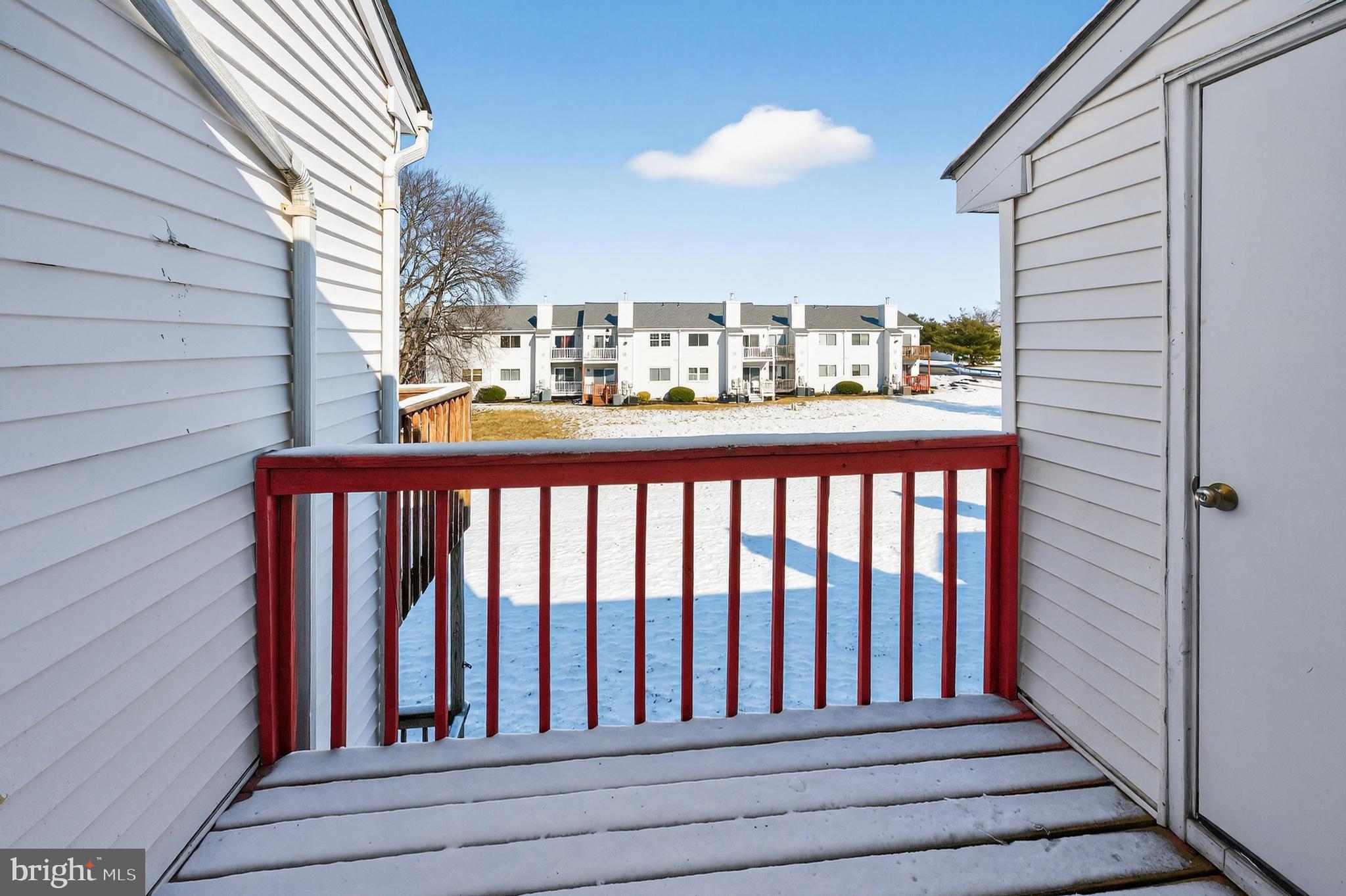 909 Woodchip Road Lumberton, NJ 08048 - Photo 4 of 20 Sunny balcony view over winter landscape.