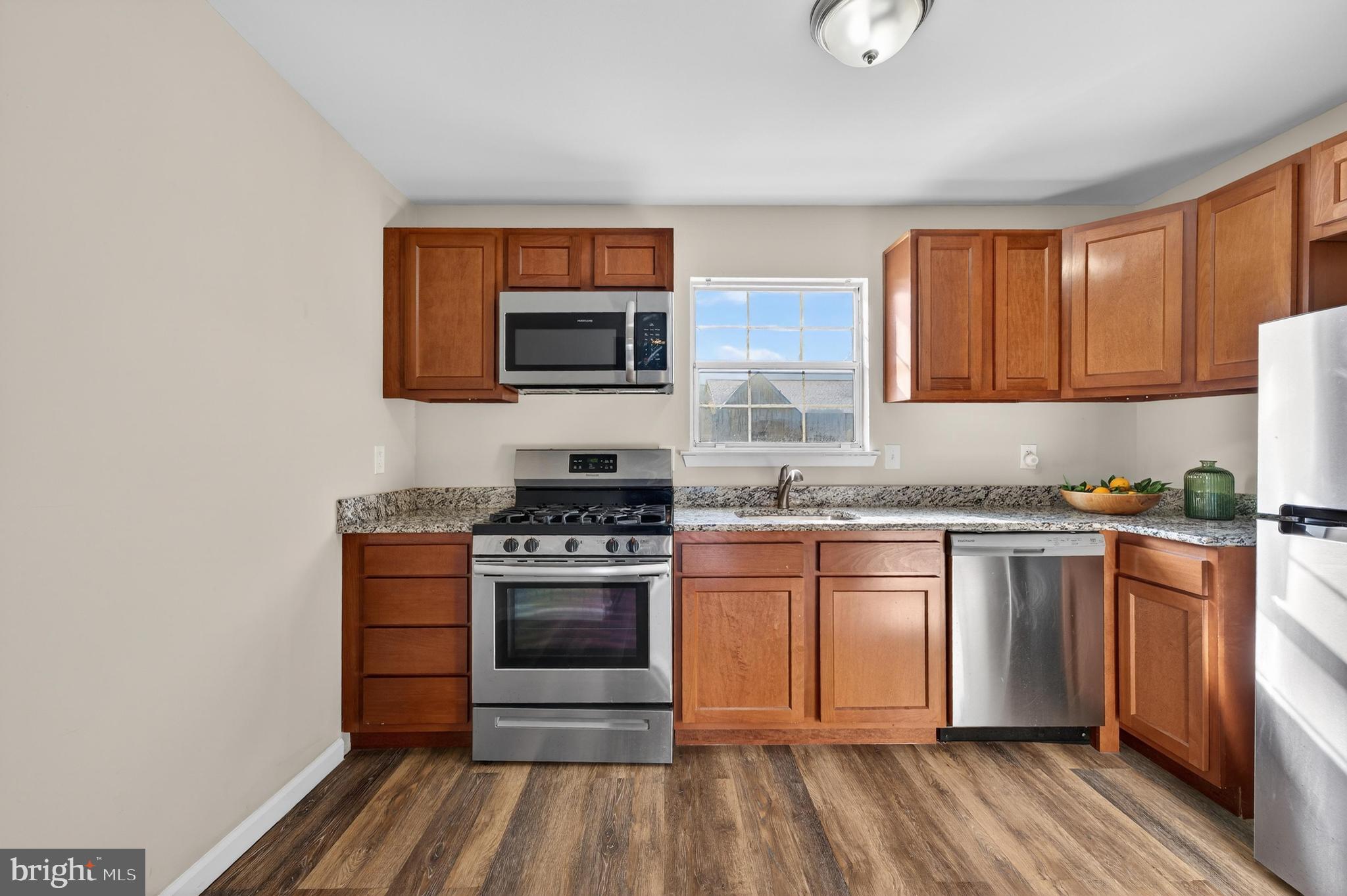 909 Woodchip Road Lumberton, NJ 08048 - Photo 10 of 20 Modern kitchen with warm wood accents.