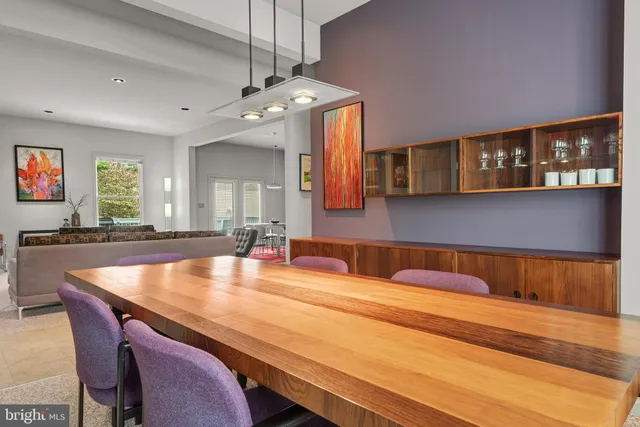 a kitchen with stainless steel appliances granite countertop a stove top oven a sink a counter top space and cabinets