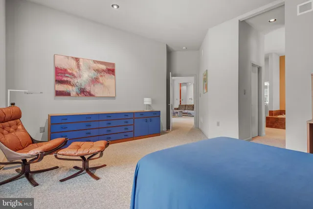 a room with a table and a mirror