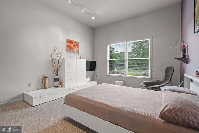 a view of a house with a yard and garage