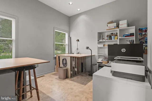 a view of a balcony with wooden floor