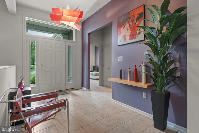 a reading room with furniture and wooden floor
