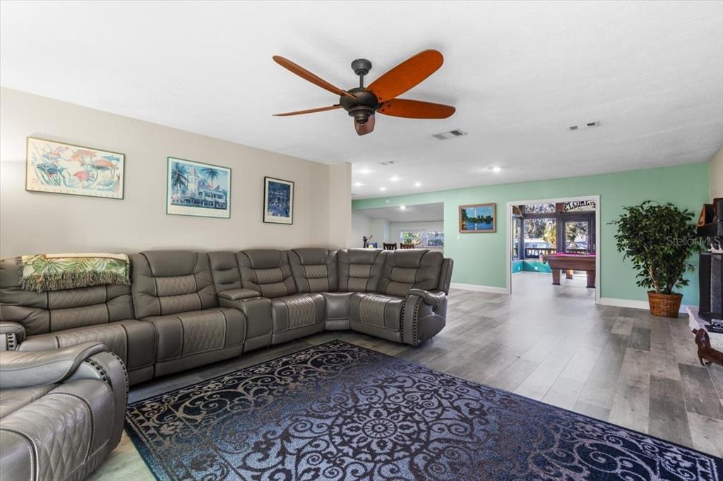 7226 Alafia Ridge Loop Riverview, FL 33569 - Photo 17 of 51 a living room with furniture and a ceiling fan