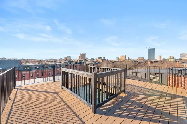 a view of roof deck with city view