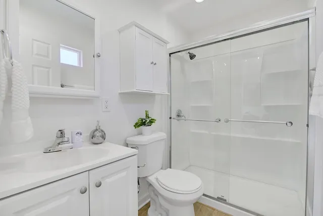 a view of a hallway with washer and dryer