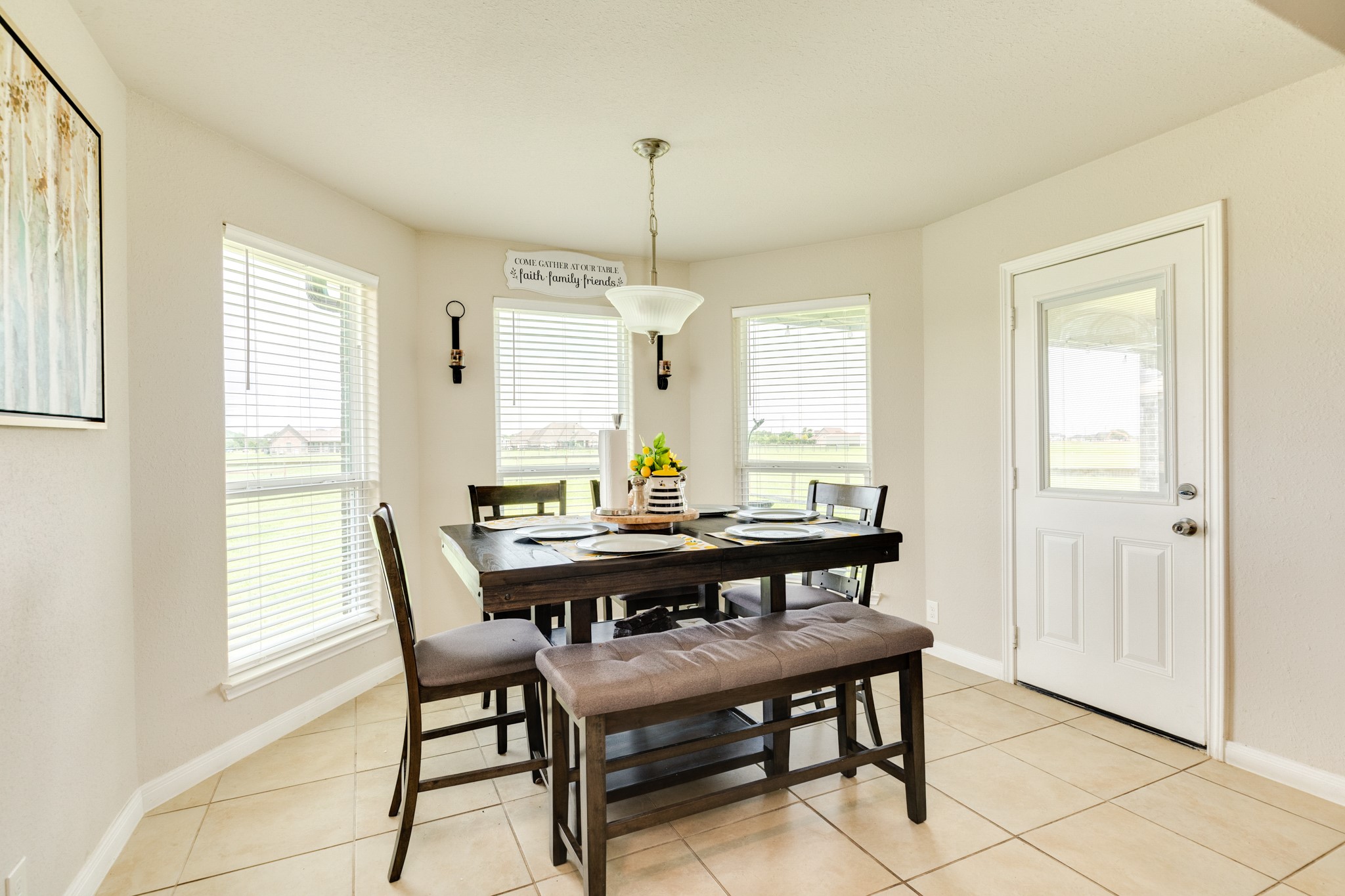 920 Quarter Horse Trail Angleton, TX 77515 - Photo 11 of 21 a view of a dining room with furniture window and wooden floor