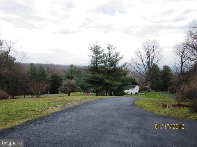 7108 Edgemont Road Frederick, MD 21702 - Photo 10 of 15 a view of a park with large trees