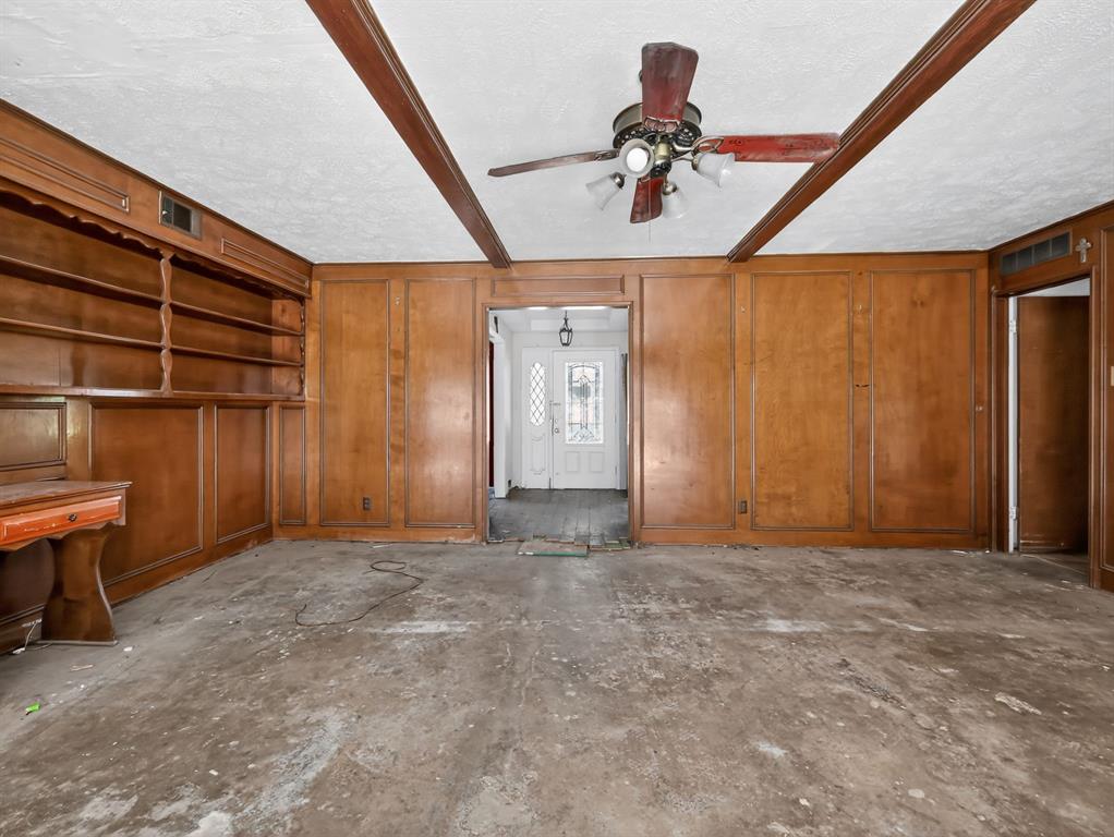3216 Rotan Lane Dallas, TX 75229 - Photo 4 of 28 a view of an empty room with a window