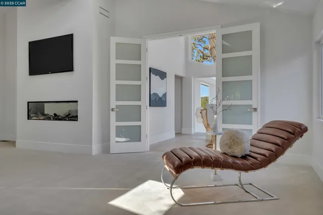 a bathroom with a double vanity sink mirror and bathtub