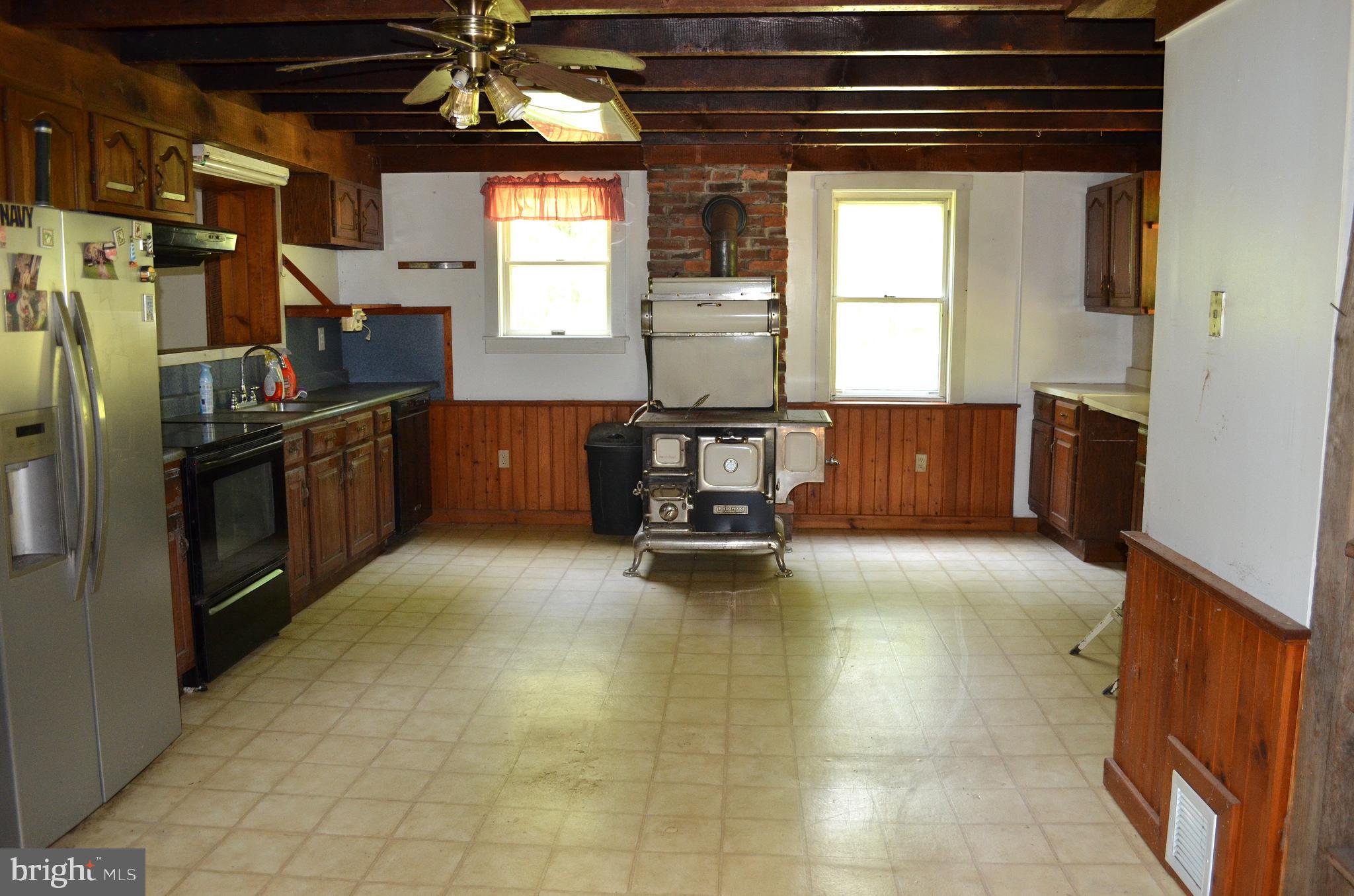 1507 Freeland Road Freeland, MD 21053 - Photo 17 of 35 a kitchen with a cabinets and appliances