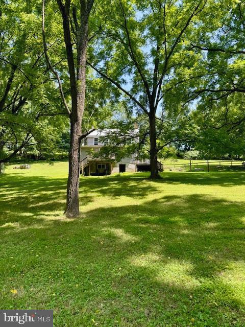 1507 Freeland Road Freeland, MD 21053 - Photo 2 of 35 a view of a big yard with a tree