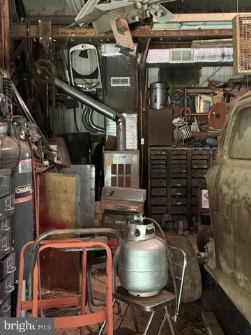 a close up of light pole on a green field