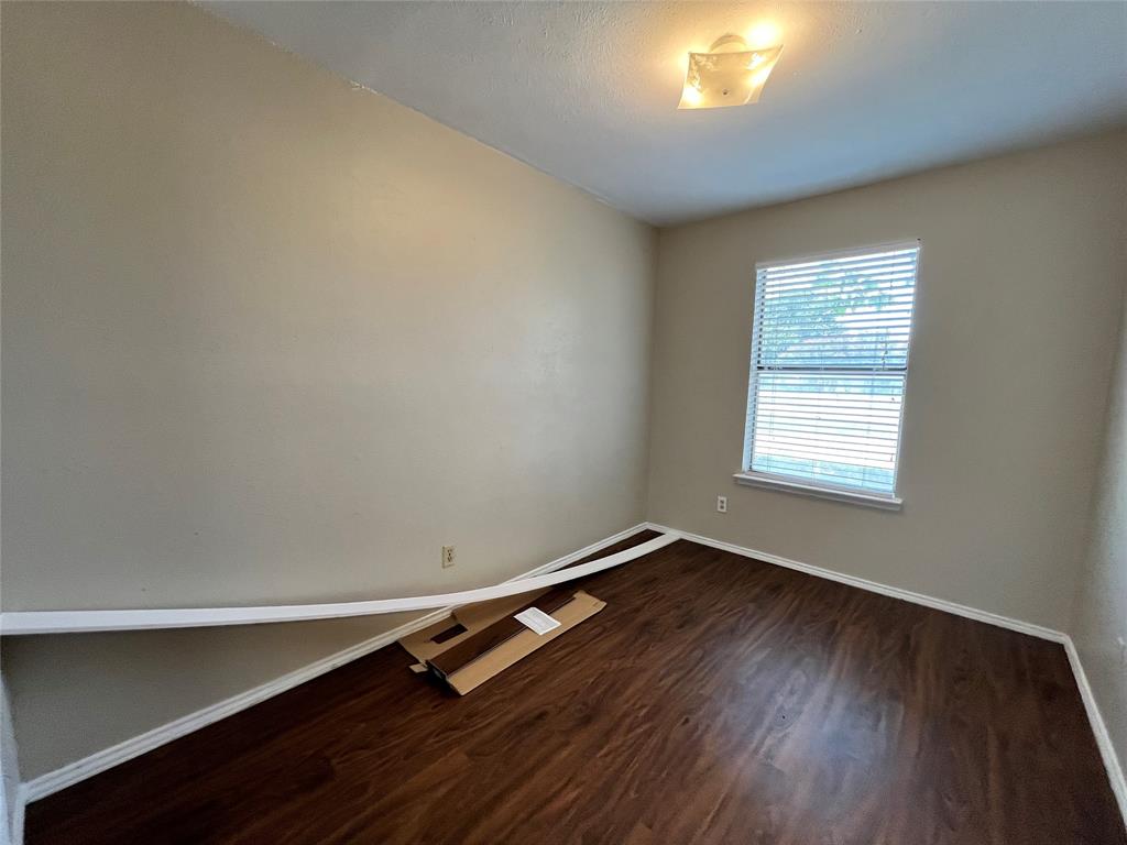 2526 West Prairie Street, Unit 108 Denton, TX 76201 - Photo 6 of 12 This view of a bedroom shows the lovely view from the window.