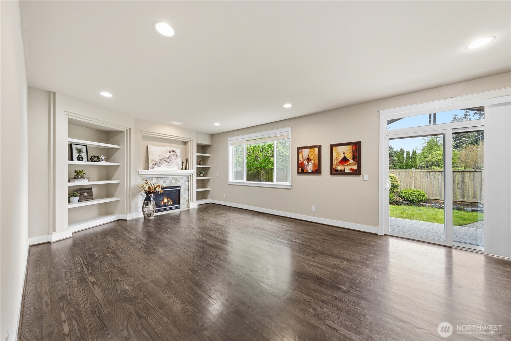 3514 184th Place Southeast Bothell, WA 98012 - Photo 5 of 39 an empty room with wooden floor and windows