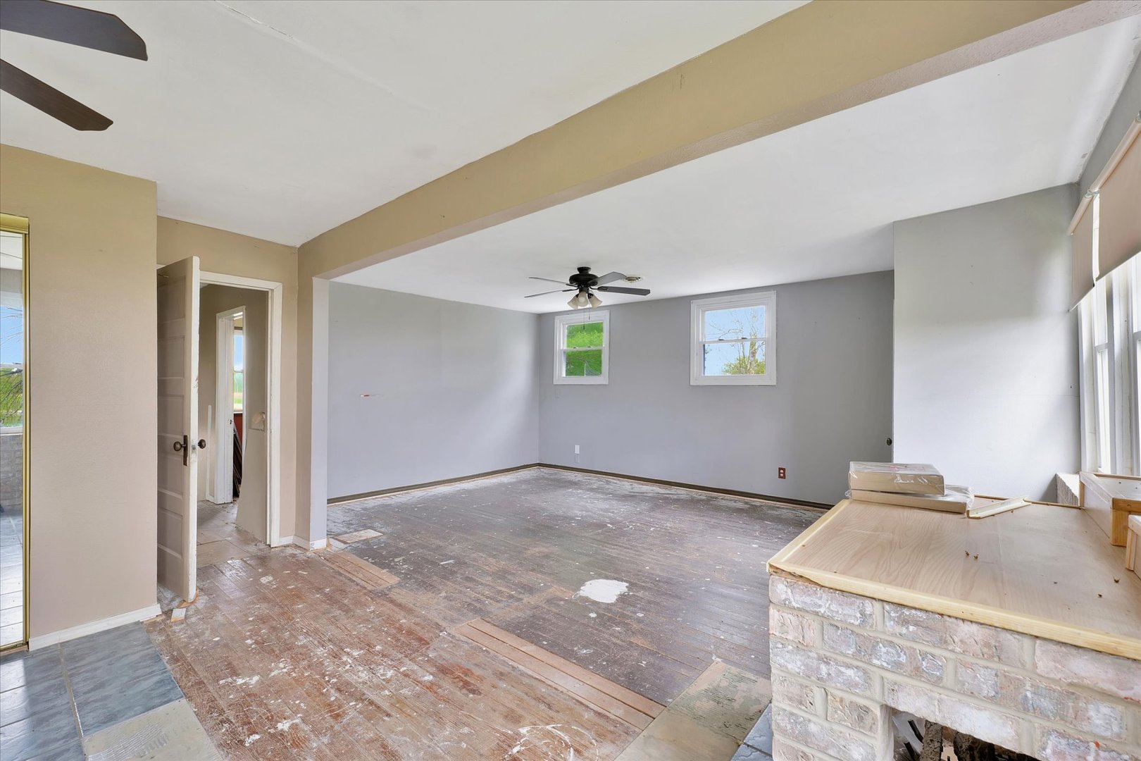 991 Lincoln Hwy Road Lerna, IL 62440 - Photo 24 of 31 a view of a kitchen with a sink hardwood floor and a livingroom view