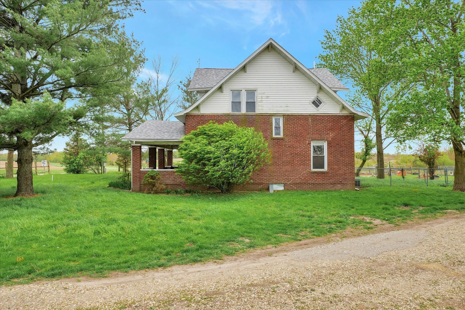 991 Lincoln Hwy Road Lerna, IL 62440 - Photo 26 of 31 a front view of a house with a yard and trees