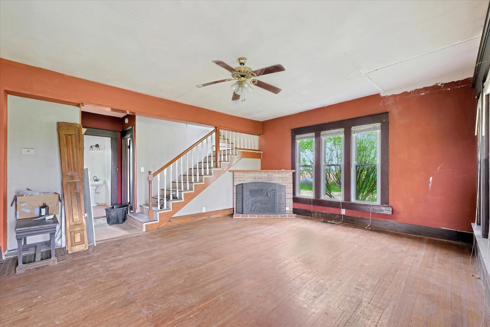 991 Lincoln Hwy Road Lerna, IL 62440 - Photo 5 of 31 wooden floor in an empty room with a window