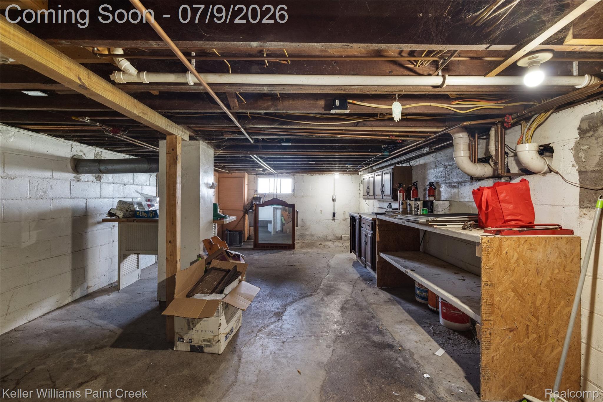 28780 School Section Road Richmond, MI 48062 - Photo 29 of 50 Unfinished basement featuring exposed wood joists and concrete flooring