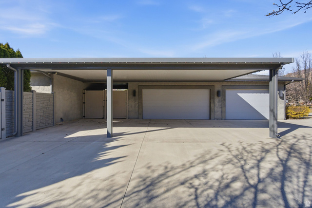 145 Carnesecca Court Mapleton, UT 84664 - Photo 95 of 109 Garage featuring concrete driveway