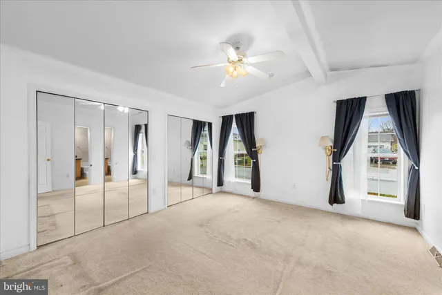 a view of a livingroom with a staircase