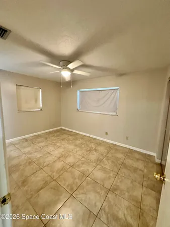 a house view with a backyard space