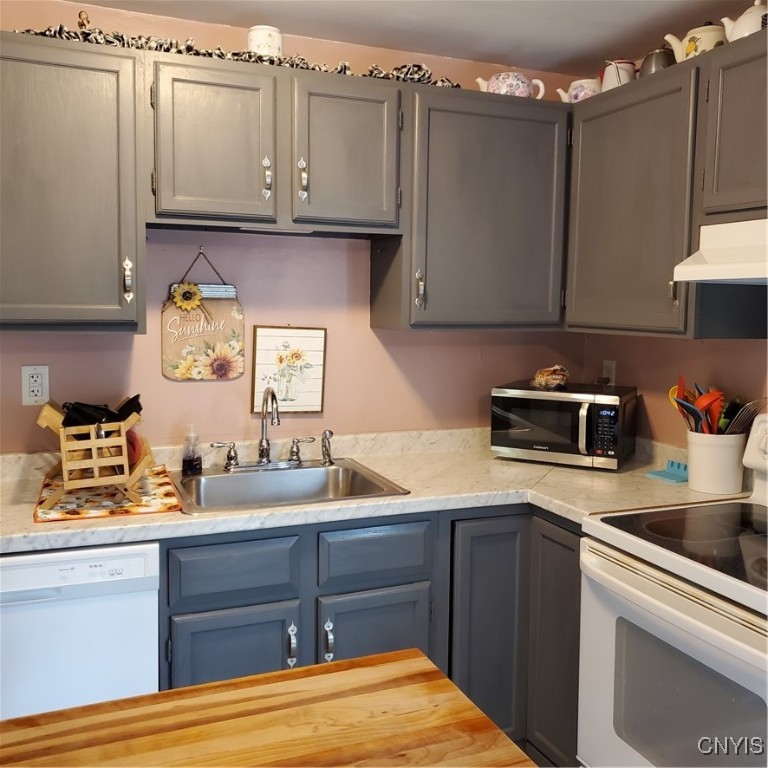 313 Roberts Street Lenox, NY 13032 - Photo 7 of 22 Close up of kitchen on right apartment.
