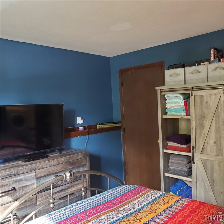 313 Roberts Street Lenox, NY 13032 - Photo 10 of 22 Primary bedroom's closet area.