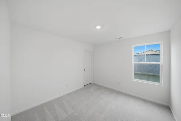 a view of empty room with window