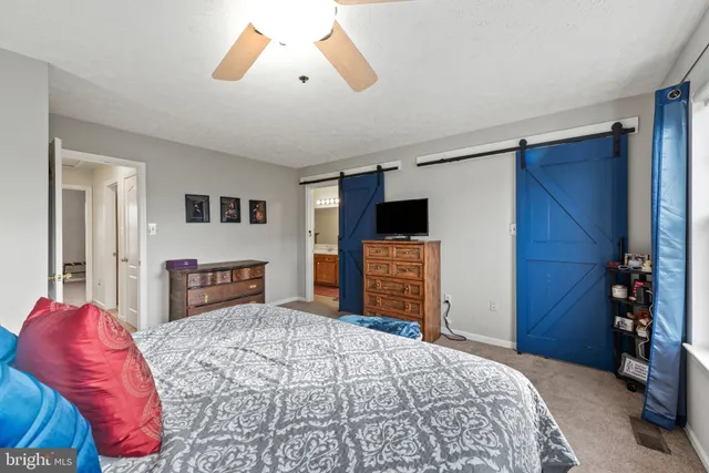 a bathroom with a sink a vanity and a mirror