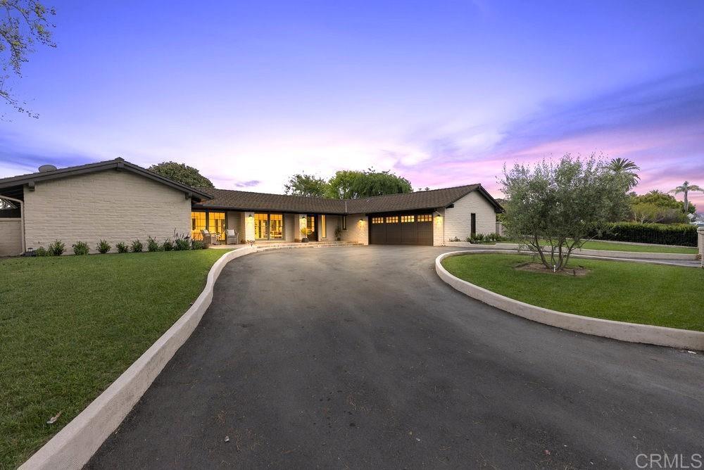 6209 Paseo Delicias Rancho Santa Fe, CA 92067 - Photo 1 of 1 a view of a house with a yard