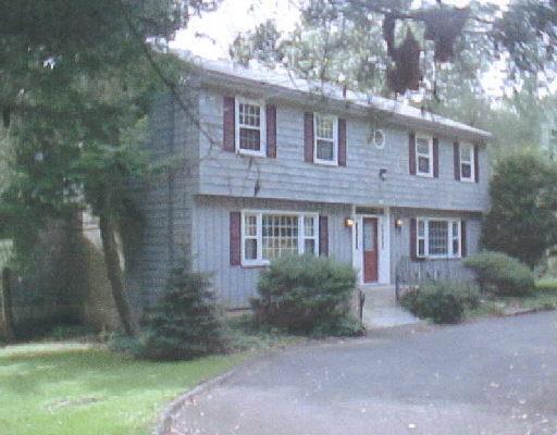 44 Hop Brook Road Brookfield, CT 06804 - Photo 1 of 1 a front view of a house with garden