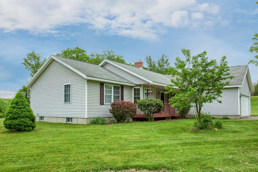 623 New Ipswich Road Ashby, MA 01431 - Photo 1 of 23 a front view of house with yard and green space